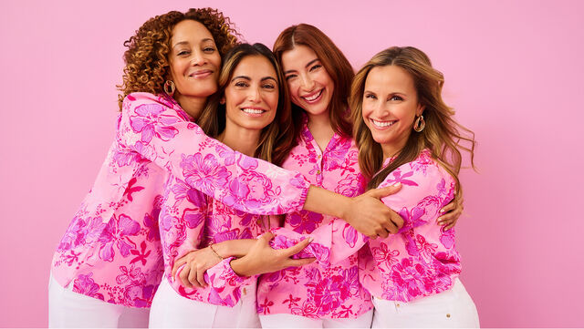 Women wearing pink printed clothing